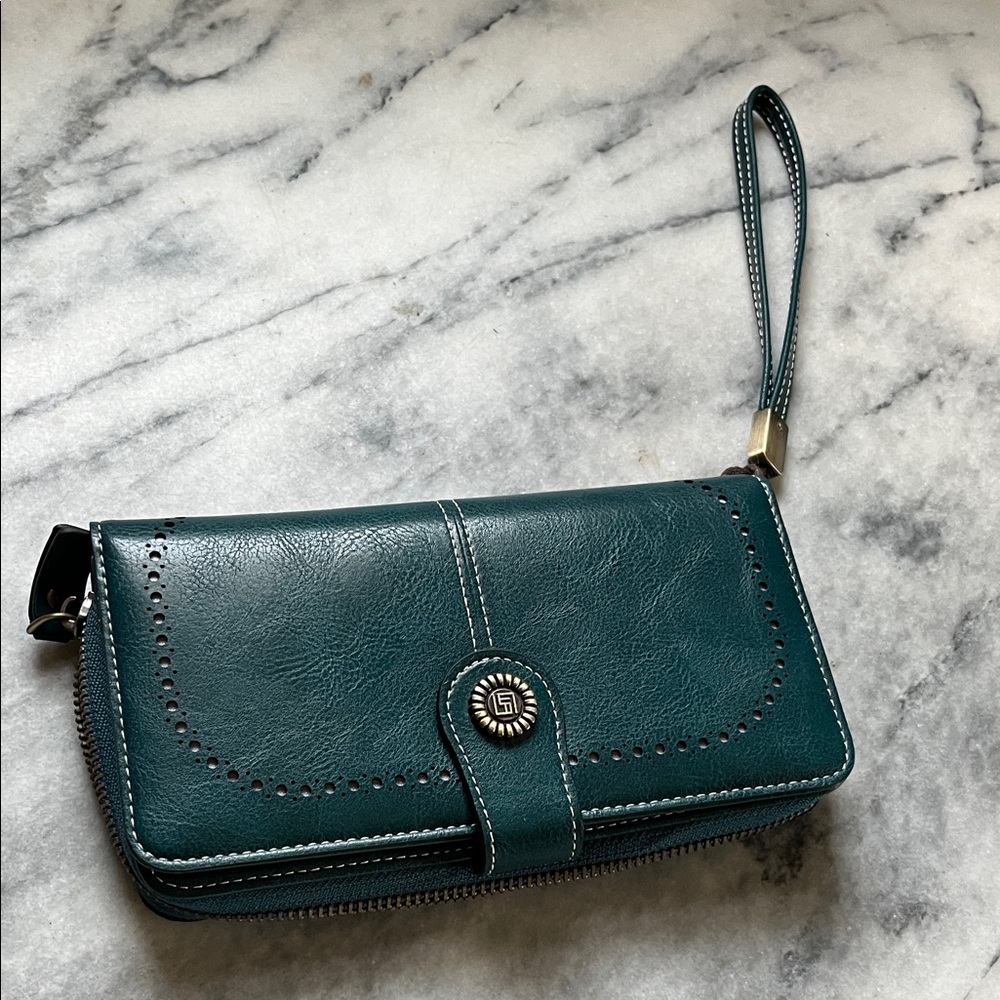 Women's Teal Wristlet Wallet with Decorative Snap Closure. Like new. Leather.